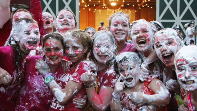 Girls smiling covered in shaving cream